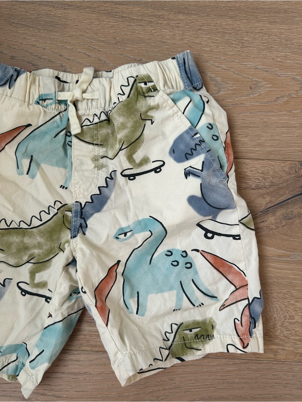H&M Elastic Waist Shorts Cream Dino Print with Blue, Green & Orange Accents 4-5T - Picture 3 of 5